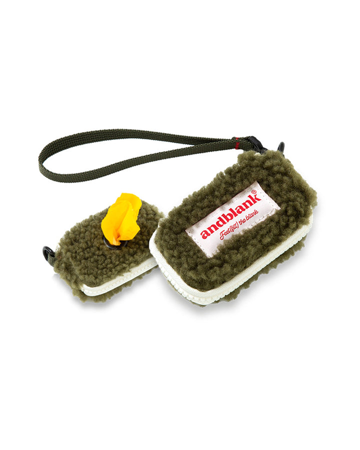 Petssogood fleece poop bag holder for dogs, lightweight and durable with buckle for easy attachment to leash or bag; stylish and cozy for chilly walks.
